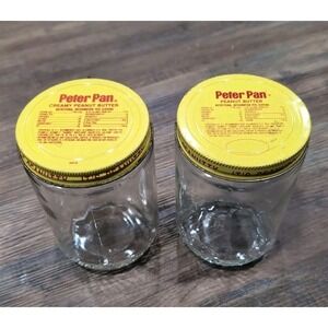 2 Vintage Peter Pan Peanut Butter Jar w/ Lid no wrap  "It's Peanutty"